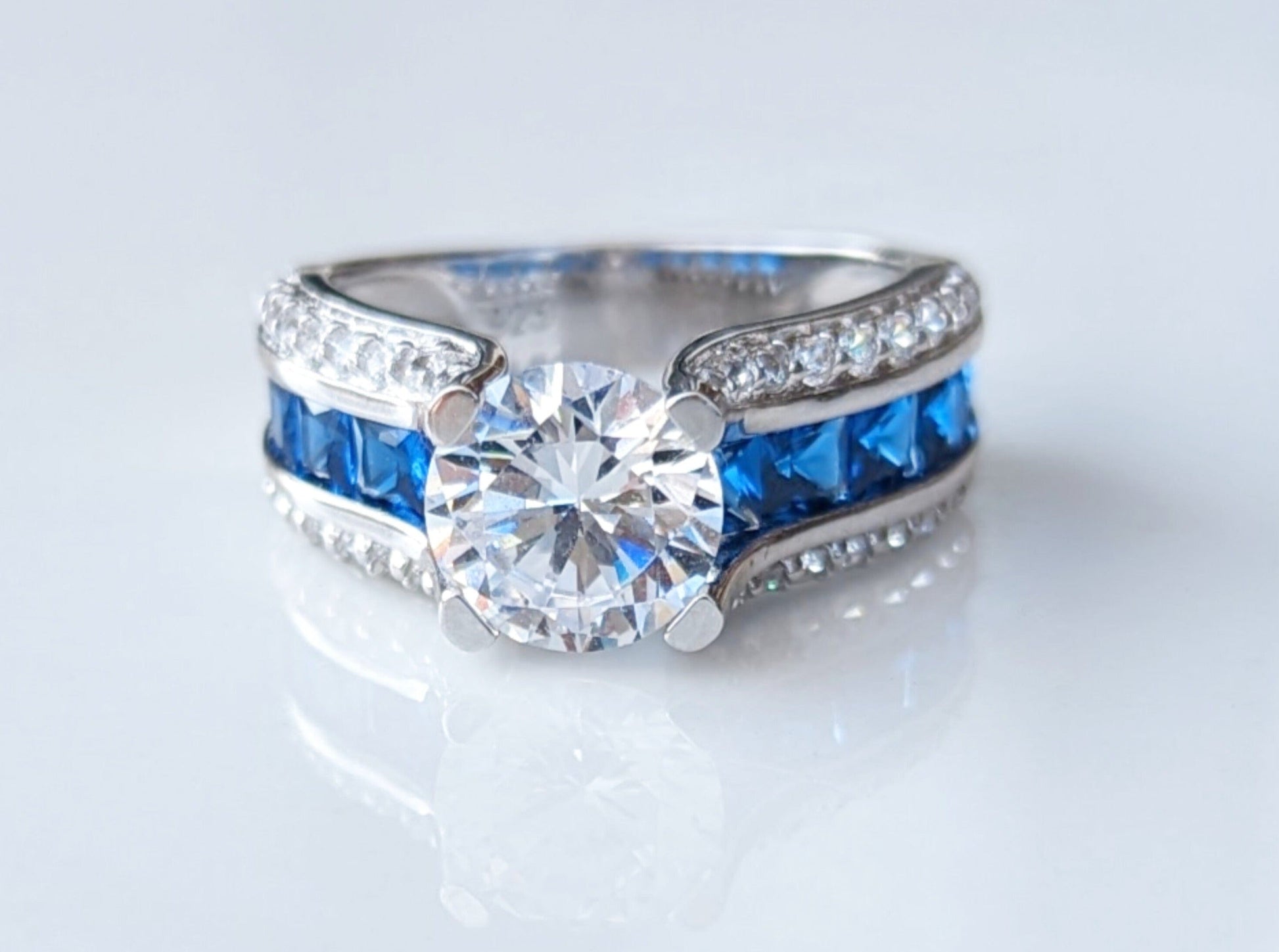 Sterling Silver Round & Princess Cut Clear & Blue Spinel CZ