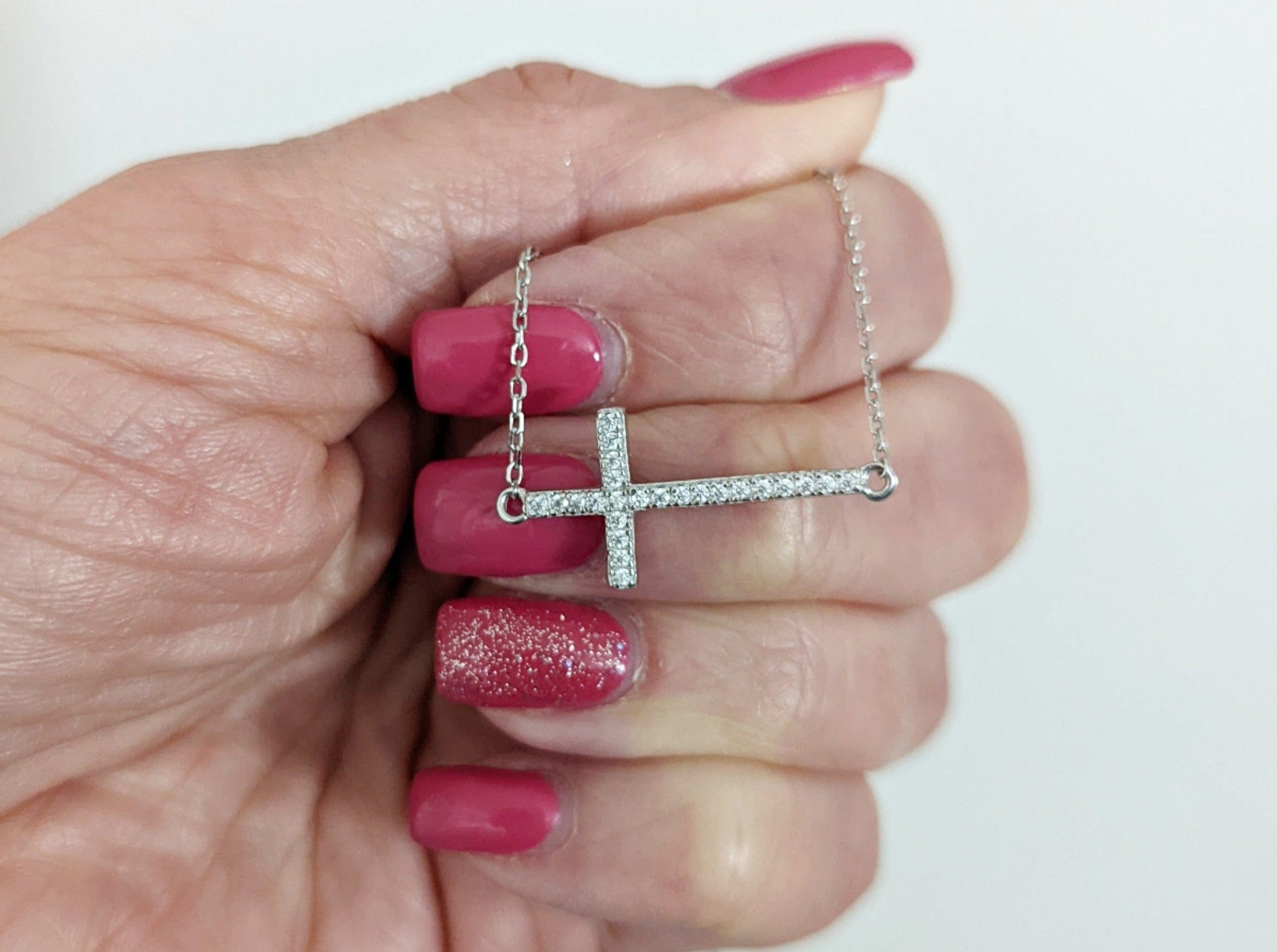Sterling Silver Sideways Cubic Zirconia Cross Necklace -
